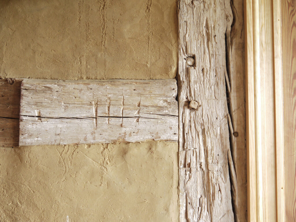 Detail von lehmsichtiger Fachwerk-Innenwand, Stuer-Winkel